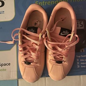 Girls size 3y pink Nike Cortez lightly worn clean bottom No scratches or scuffs.